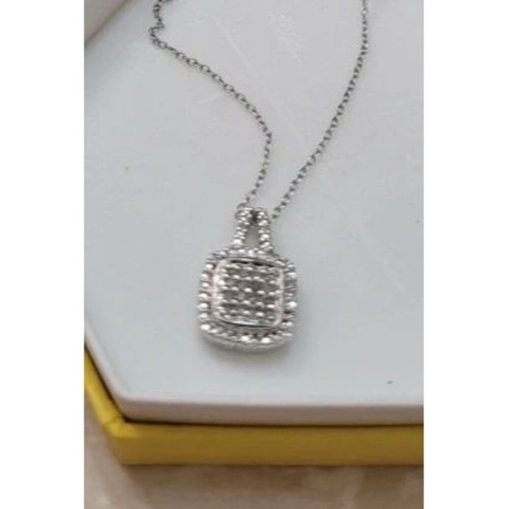 Silver toned necklace with costume diamond accents
